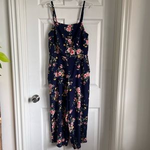 Old Navy floral jumpsuit pockets. Dark blue with pink & yellow flowers. Medium.